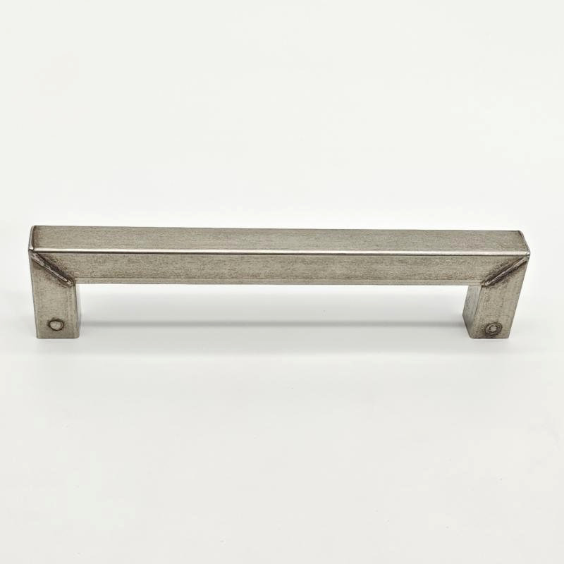 Side view of brushed gold wall hook with round mounting base