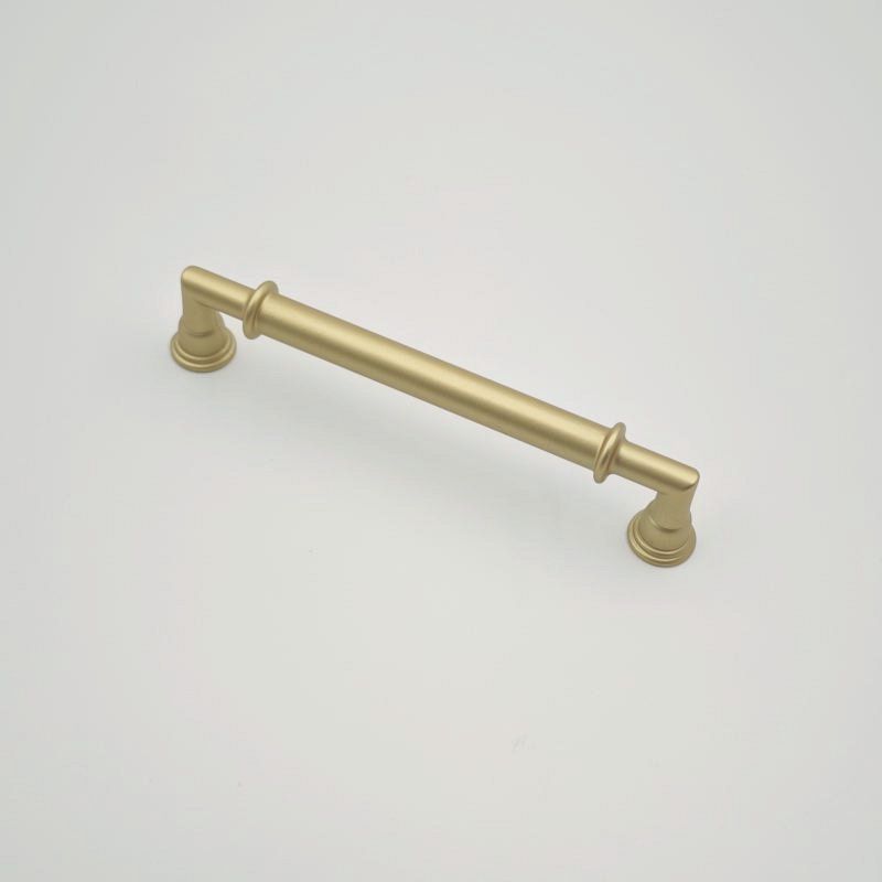 Brushed brass round bar cabinet handle with decorative rings for kitchen cabinets and furniture